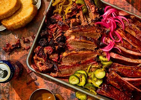 Pan containing cooked meat and vegetables